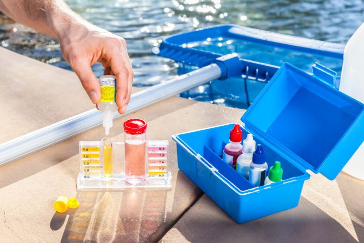 Pool water testing and chemical treatment